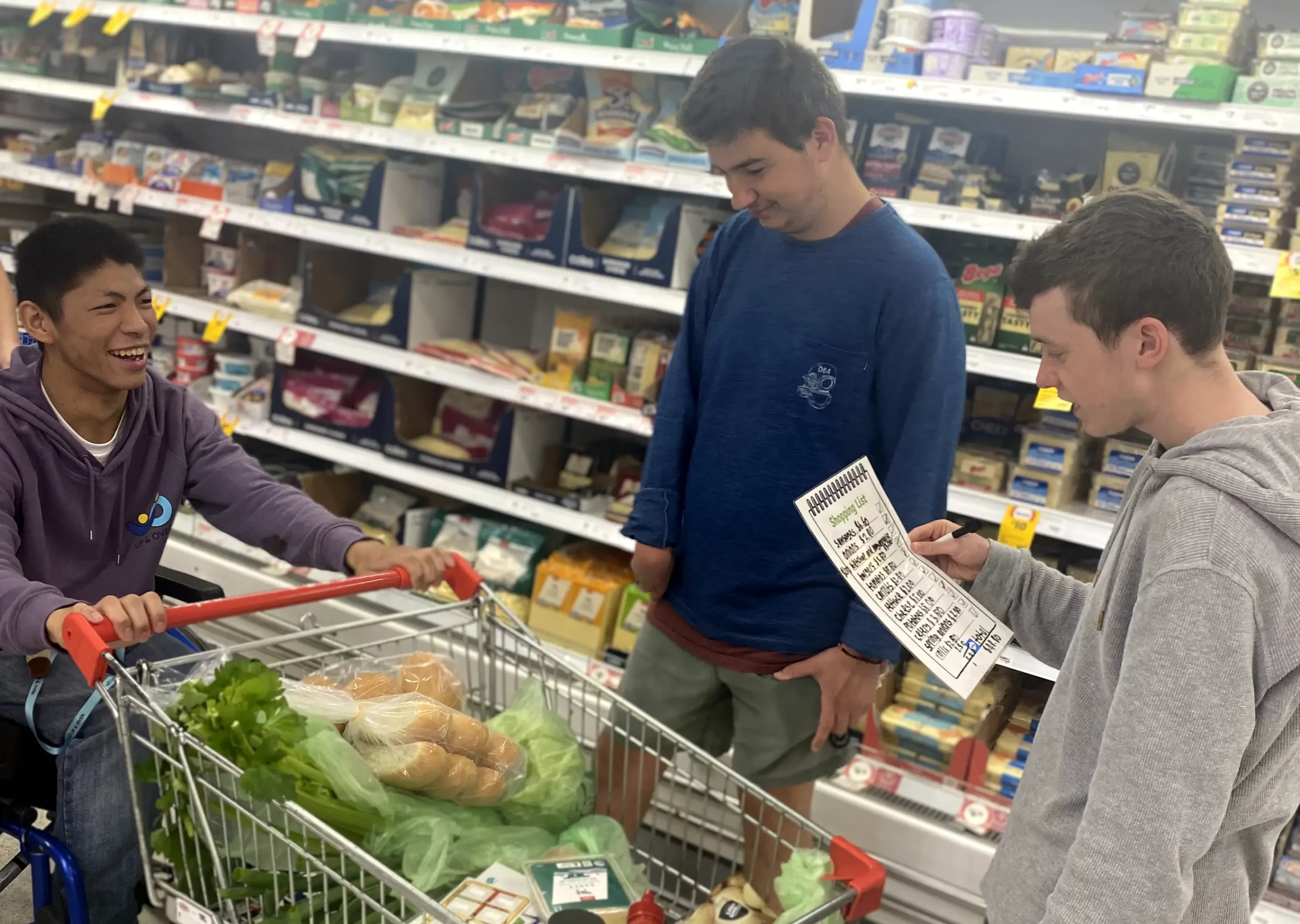young adults shopping together, practicing life skills at eds change